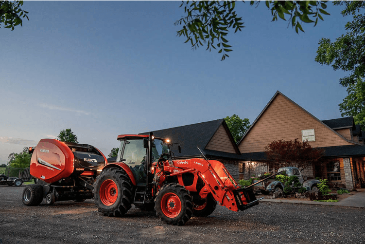 Kubota M5 Series tractor with baler rear implement