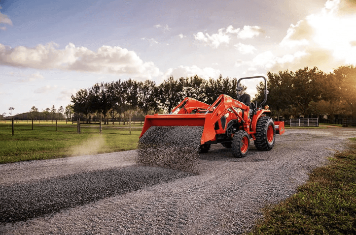 tractor laying down gravel