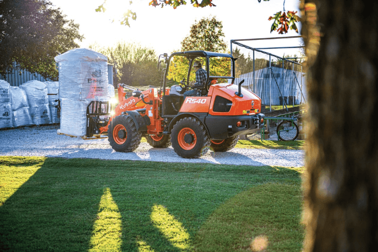 Wheel loader moving material