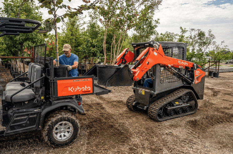 Loader loading into the back of rtv