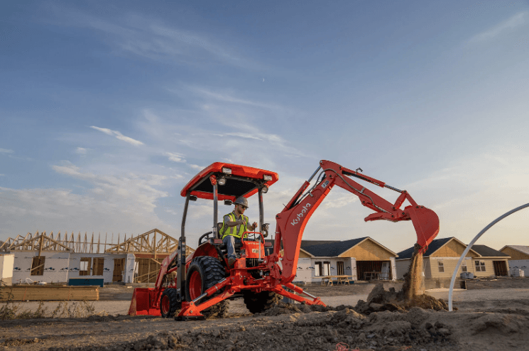 A Tractor Loader Backhoe excavating on a site