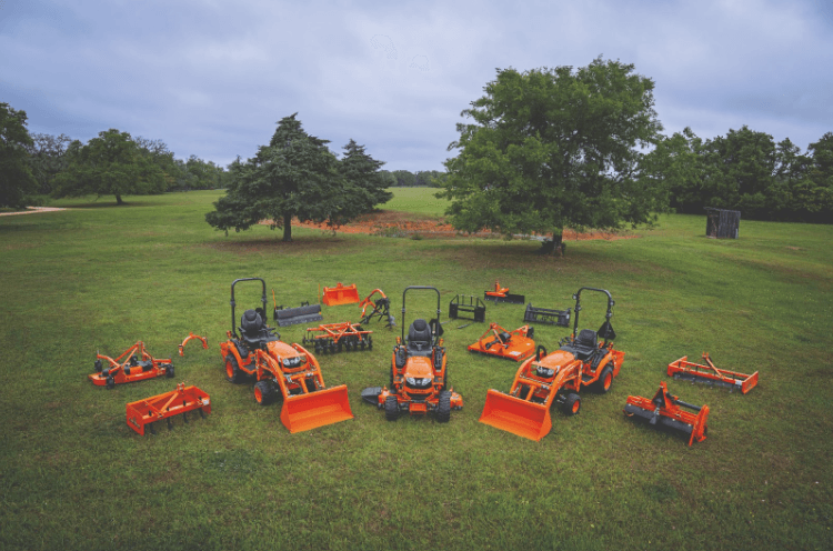 Kubota Equipment on a field with attachments