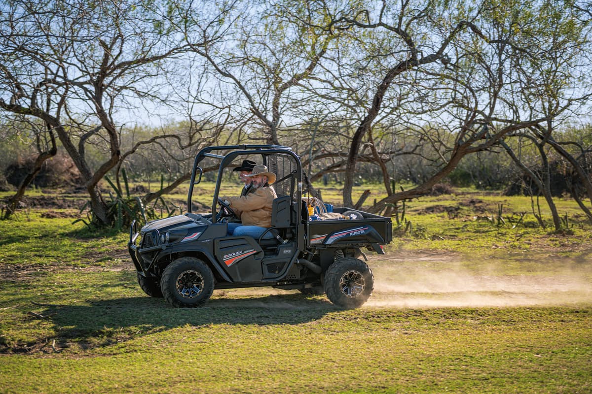 The Kubota Sidekick with two riders