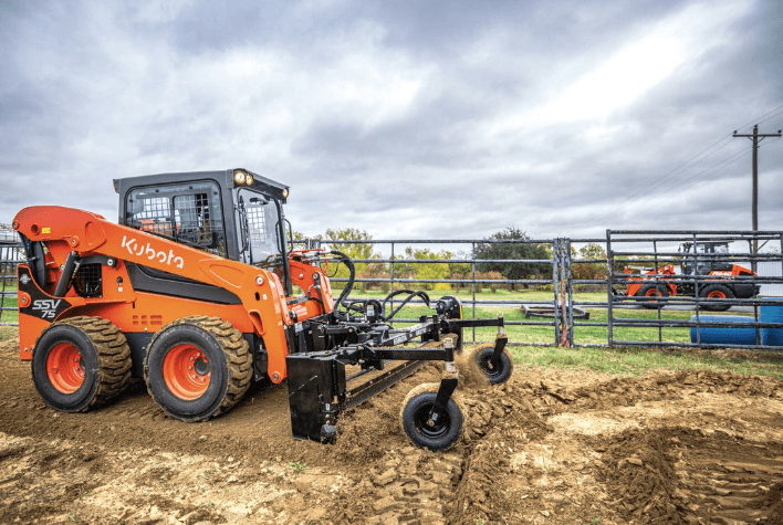 Skid Steer with leveling attachment